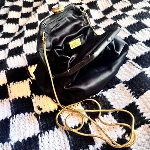 Carla Marchi black satin evening bag… looks pretty cool in the daytime, too 😘